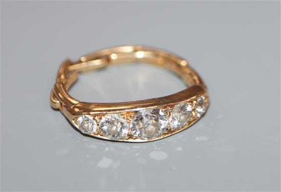 A yellow metal and diamond five stone ring, now with expandable watch strap? shank, stamped 18ct.